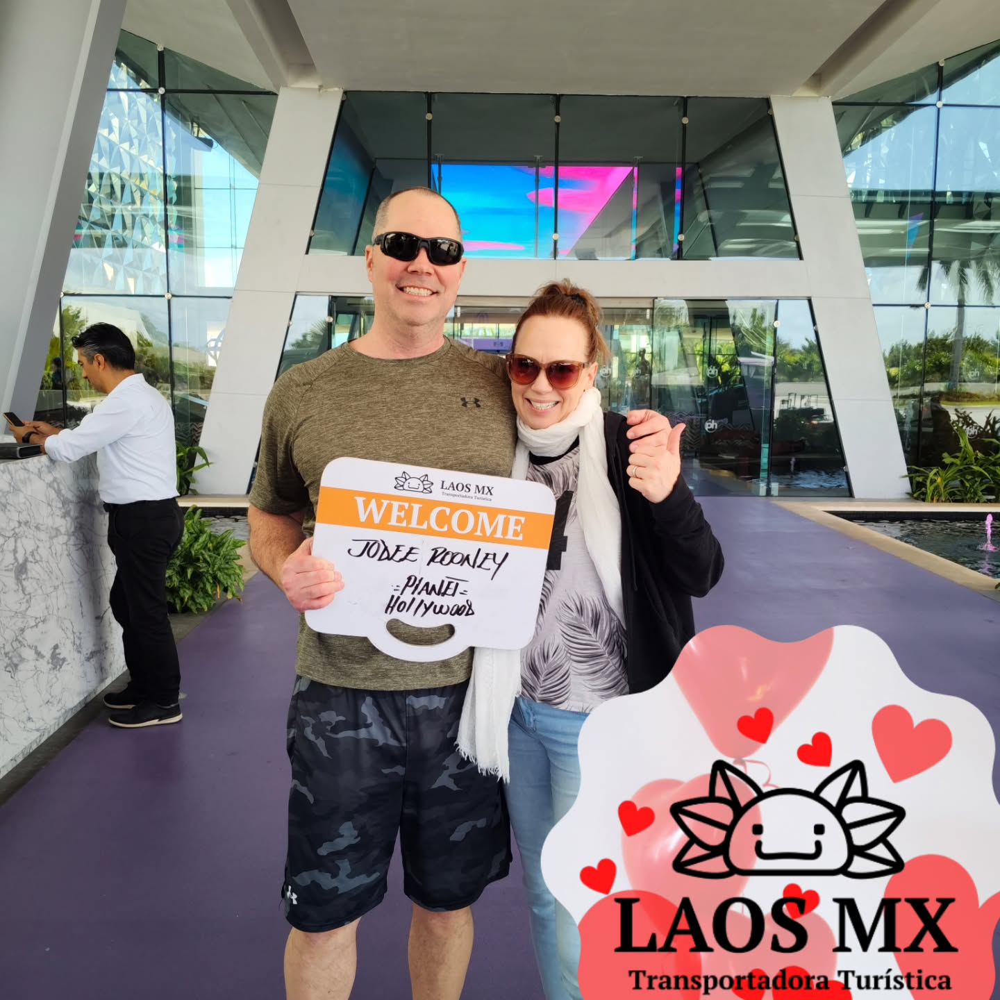 Family group pickup with LAOS MX sign